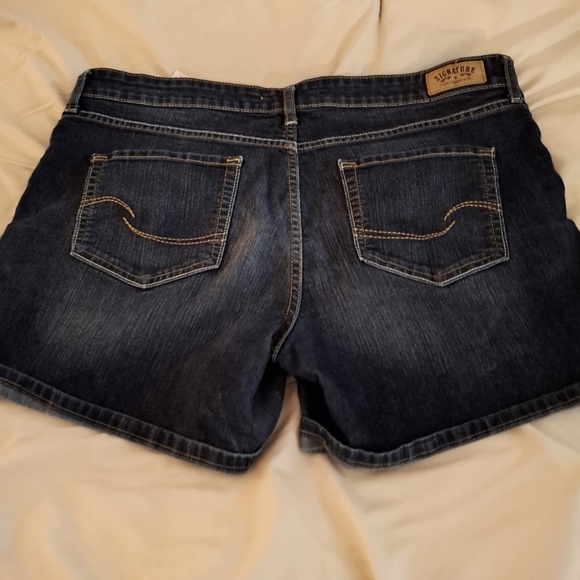 Levi's Women's Classic Dark Blue Distressed Jean Shorts - Picture 6 of 8